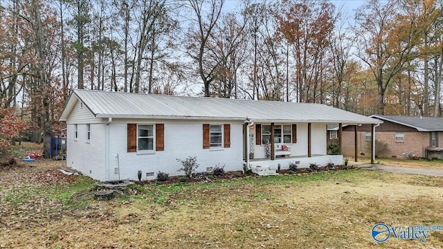 ranch-style home featuring covered porch