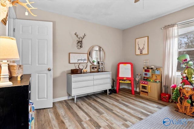 bedroom with light wood-type flooring