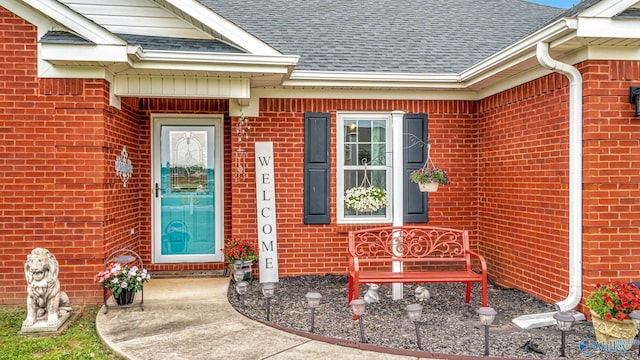 112 Bullard Rd, Hazel Green, AL 35750 - doorway to property with brick siding and a shingled roof