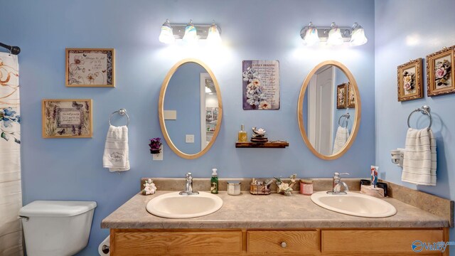 112 Bullard Rd, Hazel Green, AL 35750 - bathroom with toilet and double vanity