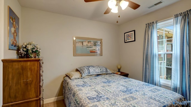 112 Bullard Rd, Hazel Green, AL 35750 - bedroom featuring multiple windows, baseboards, and a ceiling fan
