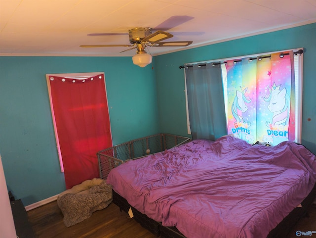 bedroom featuring ceiling fan and wood-type flooring