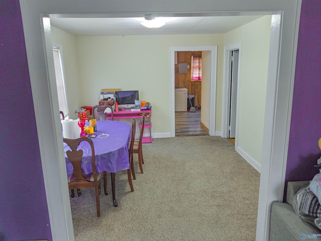 dining area featuring carpet flooring