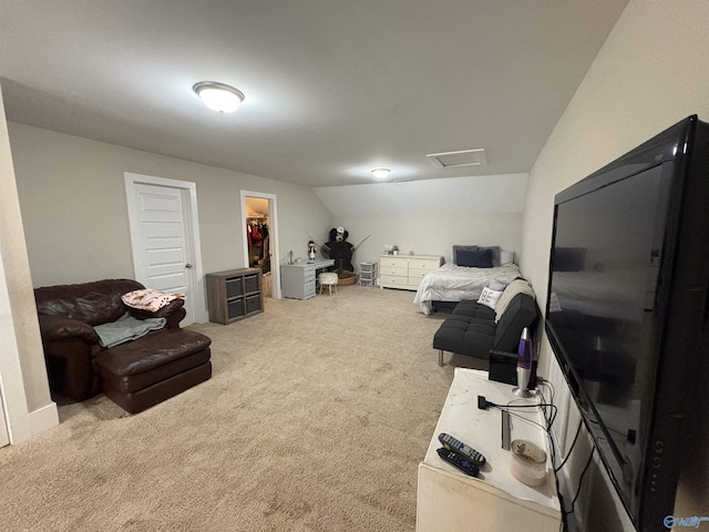 interior space with lofted ceiling and a walk in closet