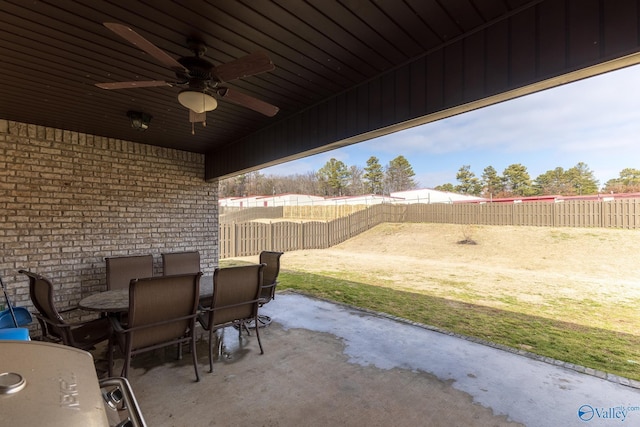 view of patio featuring ceiling fan