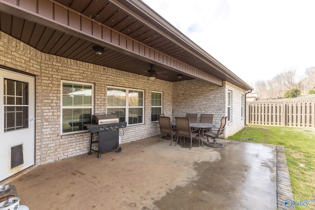 view of patio / terrace featuring ceiling fan and a grill