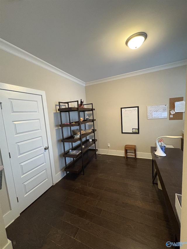 home office with crown molding and dark wood-type flooring