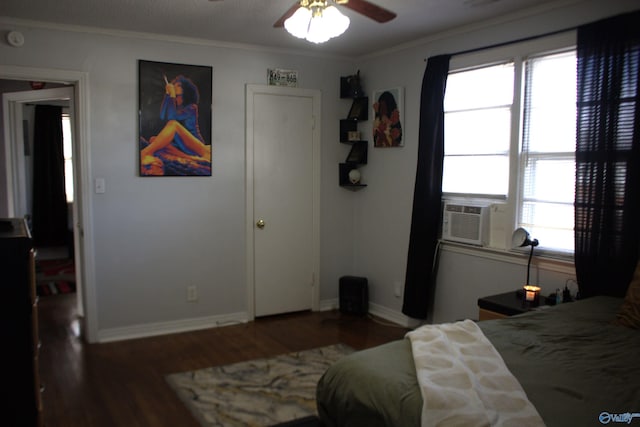 bedroom with cooling unit, ceiling fan, ornamental molding, and wood-type flooring