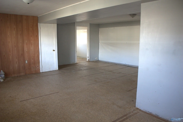 empty room with wood walls