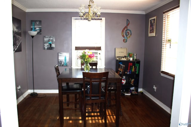 dining room featuring ornamental molding, a healthy amount of sunlight, and dark hardwood / wood-style flooring