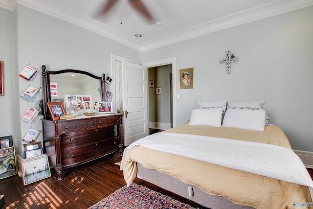 bedroom featuring dark wood-style floors, ceiling fan, and crown molding