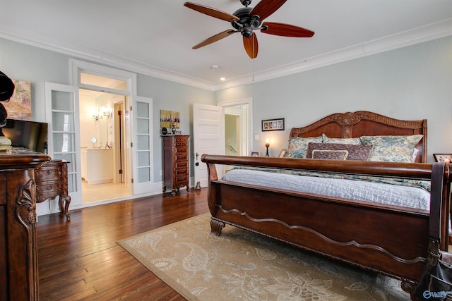 bedroom with ornamental molding and dark wood finished floors