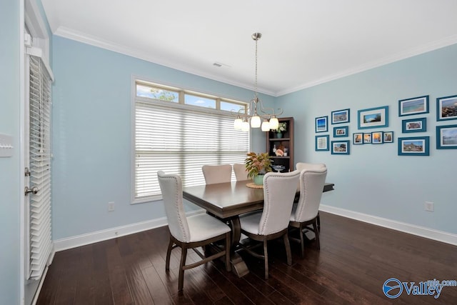 119 Autumn Cove Dr, Madison, AL 35756 - dining area featuring a chandelier, dark wood-style floors, and crown molding