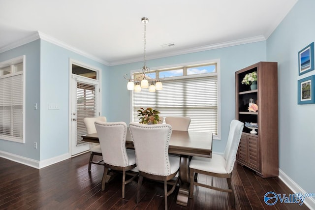 119 Autumn Cove Dr, Madison, AL 35756 - dining room with dark wood-style flooring, a chandelier, and crown molding