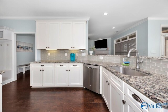 119 Autumn Cove Dr, Madison, AL 35756 - kitchen with stainless steel dishwasher, crown molding, decorative backsplash, light stone countertops, and white cabinets