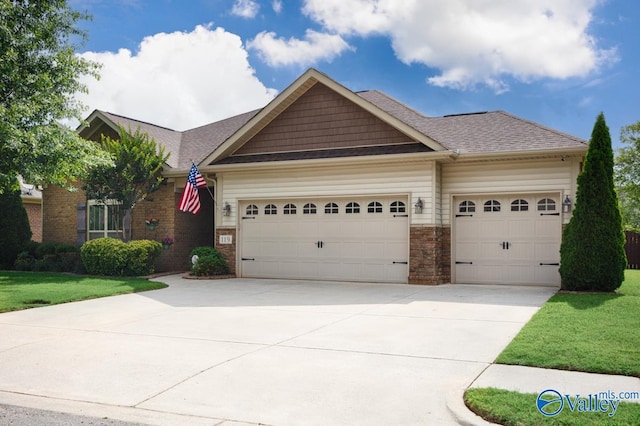 119 Autumn Cove Dr, Madison, AL 35756 - view of front facade featuring an attached garage, driveway, a front yard, and a shingled roof
