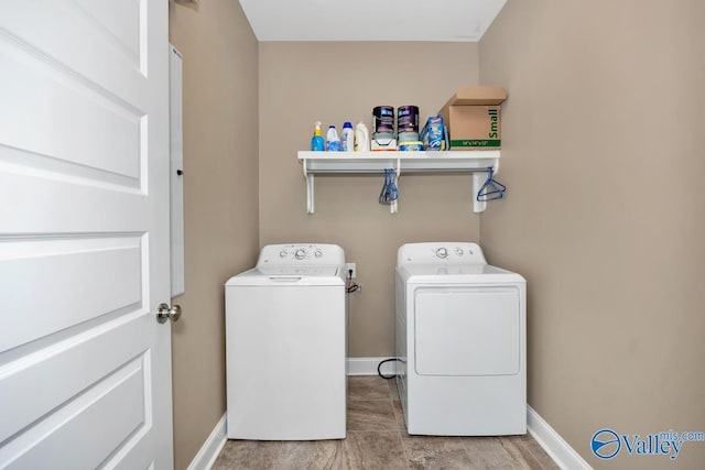 119 Autumn Cove Dr, Madison, AL 35756 - laundry room with washing machine and dryer and baseboards