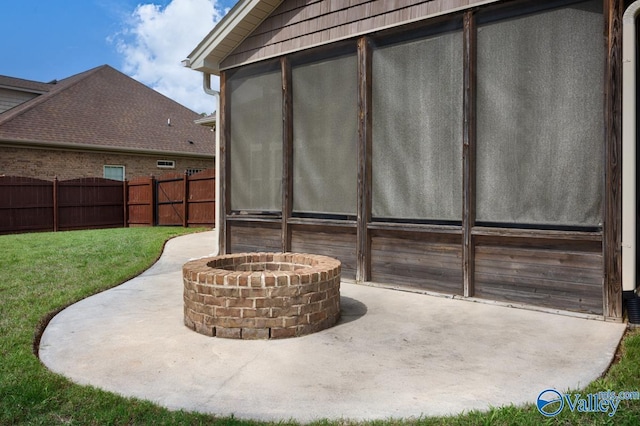 119 Autumn Cove Dr, Madison, AL 35756 - fenced backyard featuring a patio area, an outdoor fire pit, and a sunroom