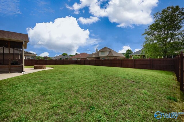 119 Autumn Cove Dr, Madison, AL 35756 - fenced backyard with a patio area