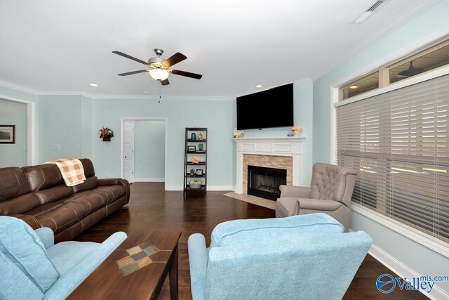 119 Autumn Cove Dr, Madison, AL 35756 - living area featuring ceiling fan, a tile fireplace, crown molding, wood finished floors, and recessed lighting