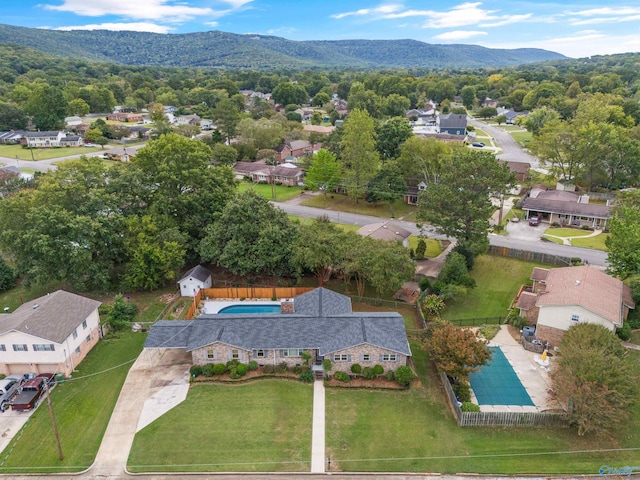 birds eye view of property featuring a mountain view