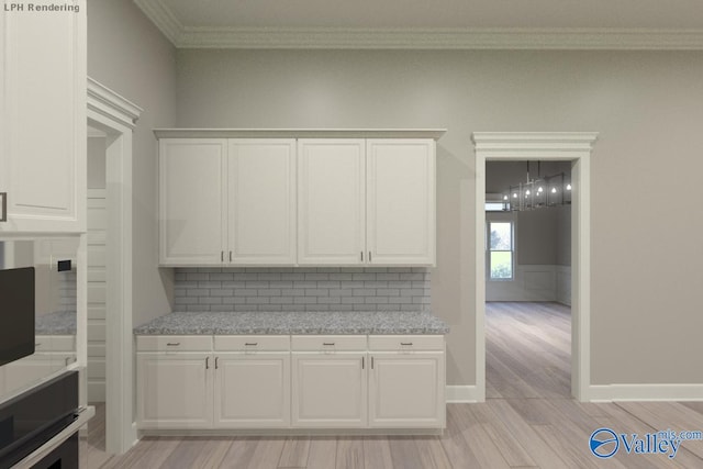 kitchen with backsplash, light hardwood / wood-style floors, and white cabinets