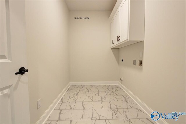 laundry room featuring cabinets, washer hookup, and hookup for an electric dryer