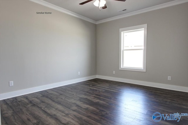 empty room featuring ornamental molding, dark hardwood / wood-style floors, and ceiling fan