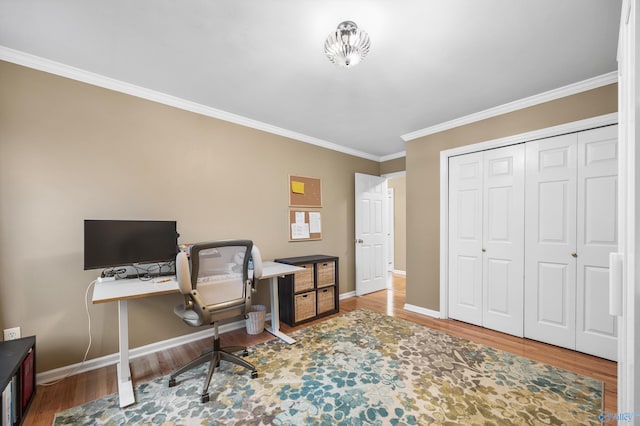 office space featuring wood-type flooring and crown molding