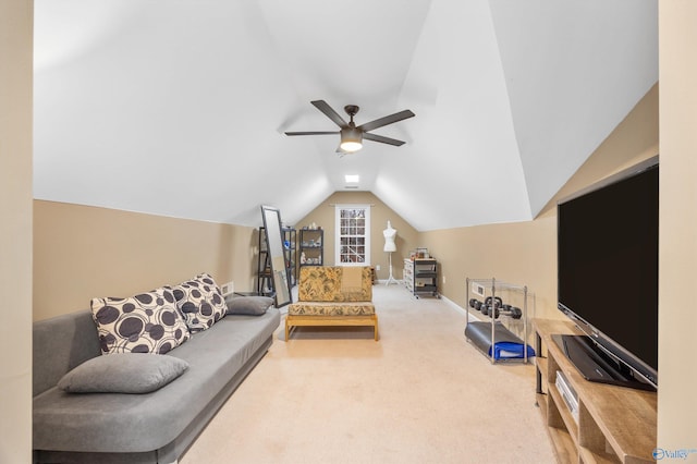 carpeted living room featuring ceiling fan and lofted ceiling