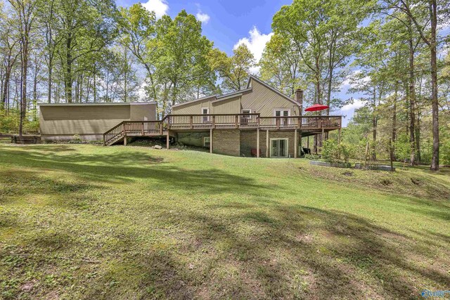 view of yard with stairs and a deck