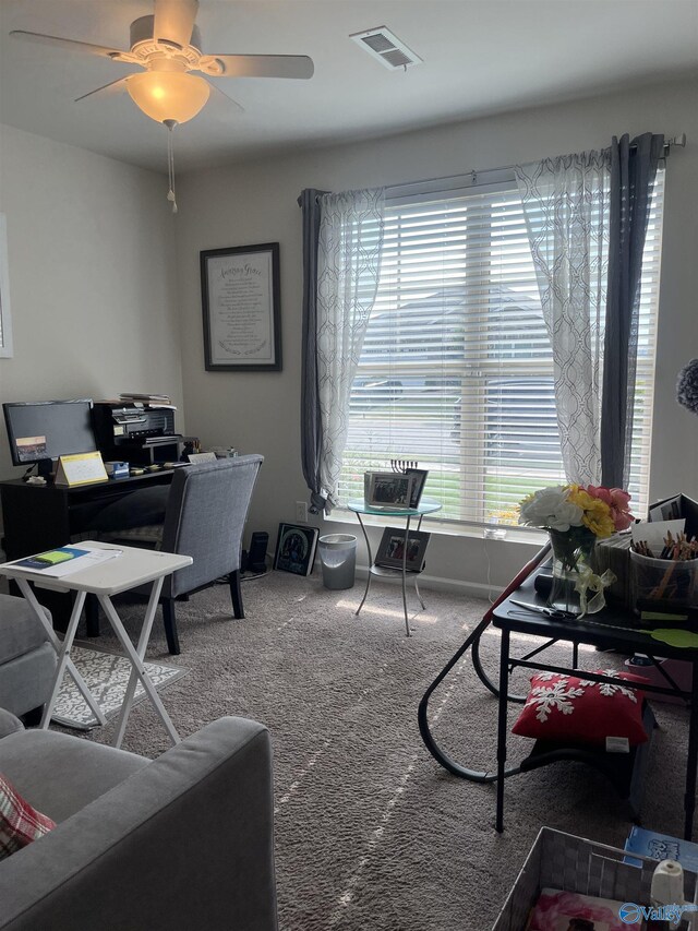 office space with carpet flooring and ceiling fan