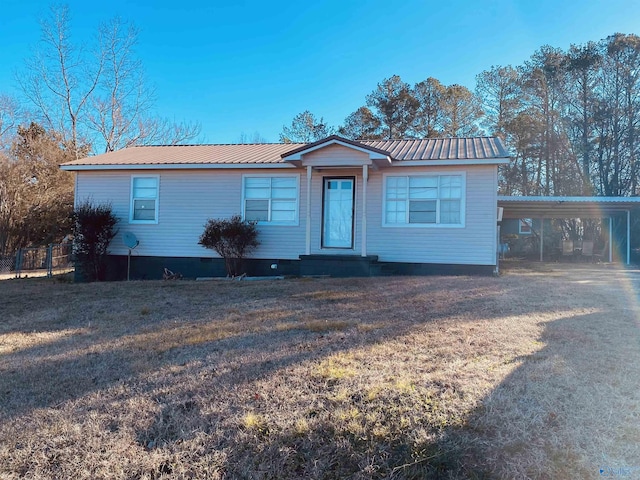 single story home with a carport and a front yard