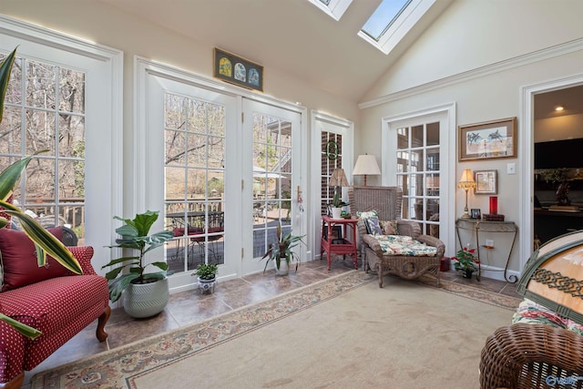 sunroom / solarium featuring a wealth of natural light, french doors, and a skylight