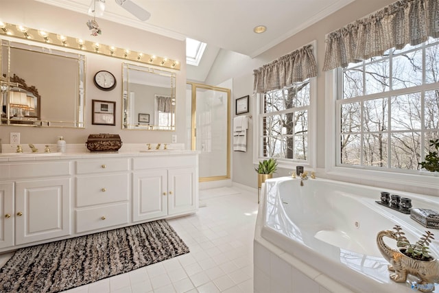 bathroom featuring double vanity, a stall shower, a whirlpool tub, a sink, and tile patterned flooring