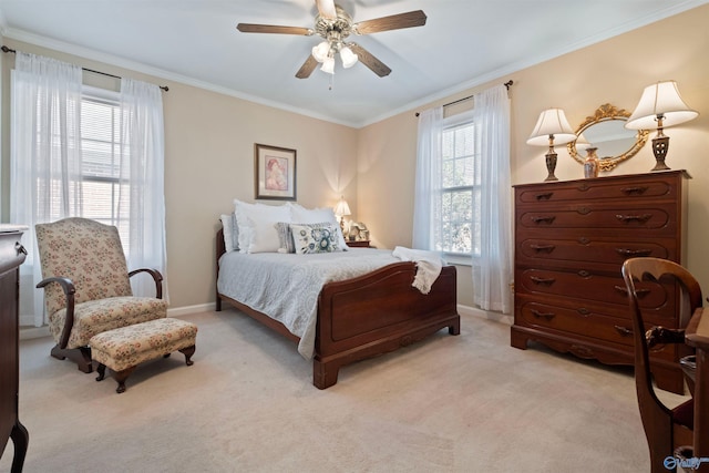 bedroom featuring ceiling fan, light carpet, baseboards, and ornamental molding