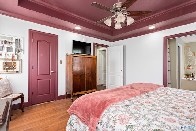 1465 Marshall Way, Southside, AL 35907 - bedroom with a raised ceiling, wood finished floors, crown molding, recessed lighting, and baseboards