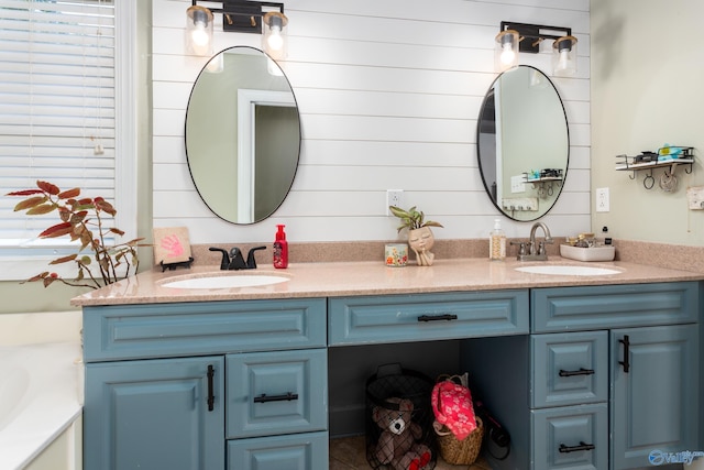 1465 Marshall Way, Southside, AL 35907 - bathroom with double vanity and a tub to relax in