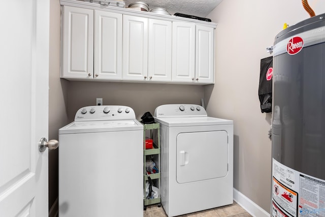 1465 Marshall Way, Southside, AL 35907 - laundry area with water heater, washing machine and clothes dryer, cabinet space, and light tile patterned floors