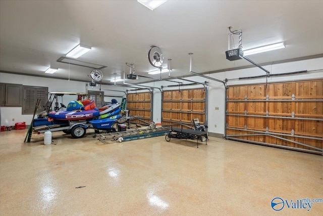 garage featuring a garage door opener