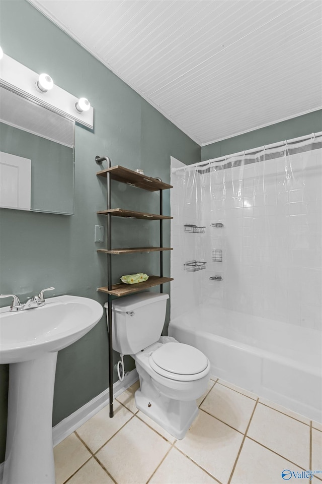 full bathroom featuring toilet, shower / tub combo, tile patterned floors, and sink