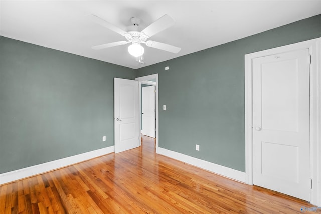 unfurnished bedroom with light wood-type flooring and ceiling fan