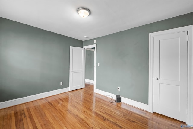 unfurnished bedroom featuring light hardwood / wood-style floors