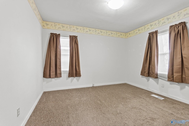 view of carpeted spare room