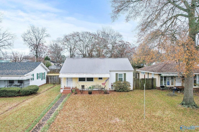 view of front of house with a front lawn