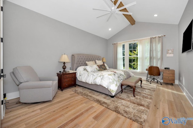 bedroom featuring ceiling fan, vaulted ceiling with beams, and wood-type flooring