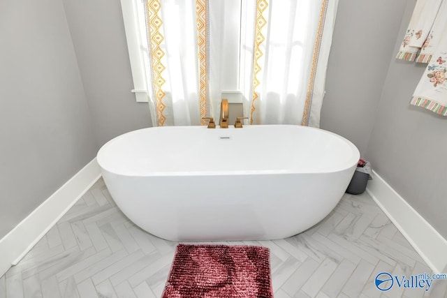 bathroom featuring a bathtub