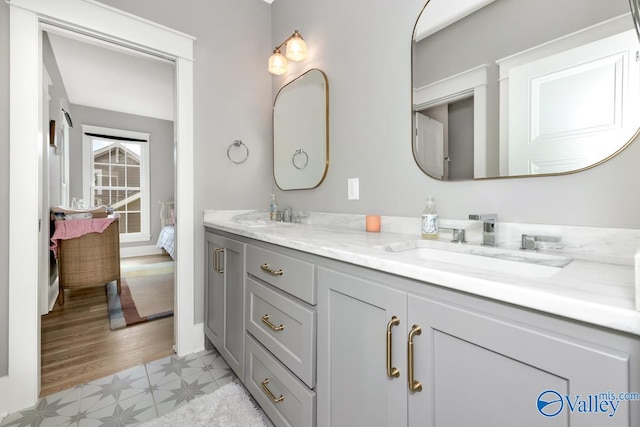 bathroom featuring vanity and hardwood / wood-style floors