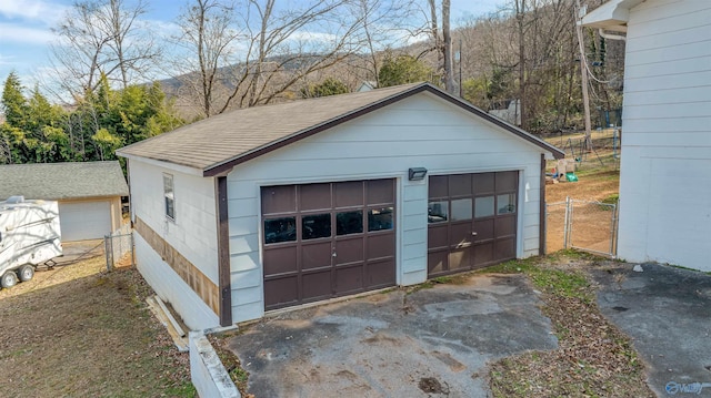 detached garage with fence