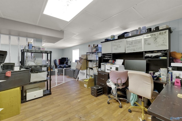 home office with wood finished floors